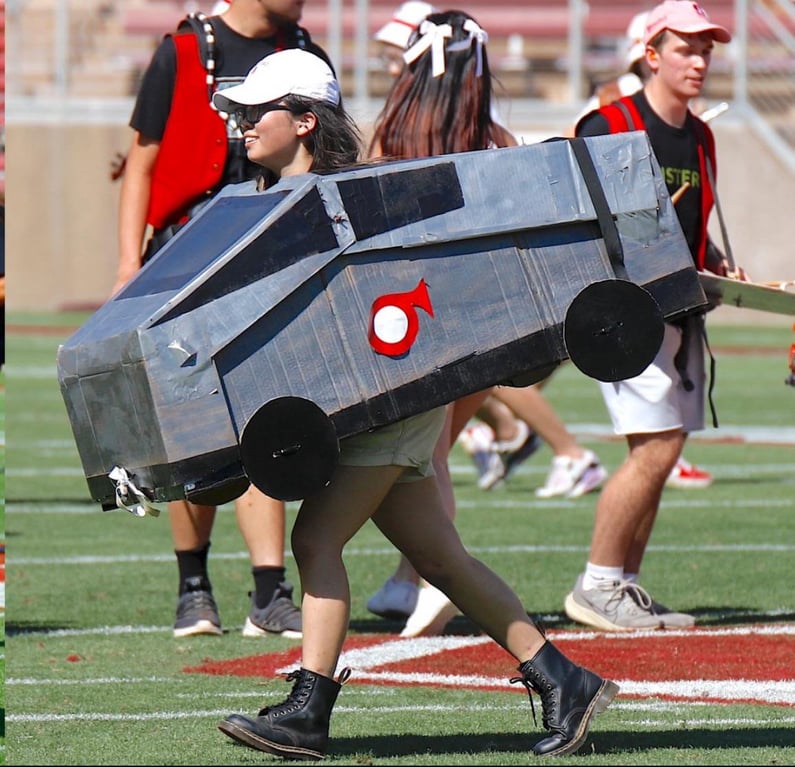 The Stanford band's halftime show yesterday had a girl dressed up in a cardboard Cybertruck that kept losing control and running into things.