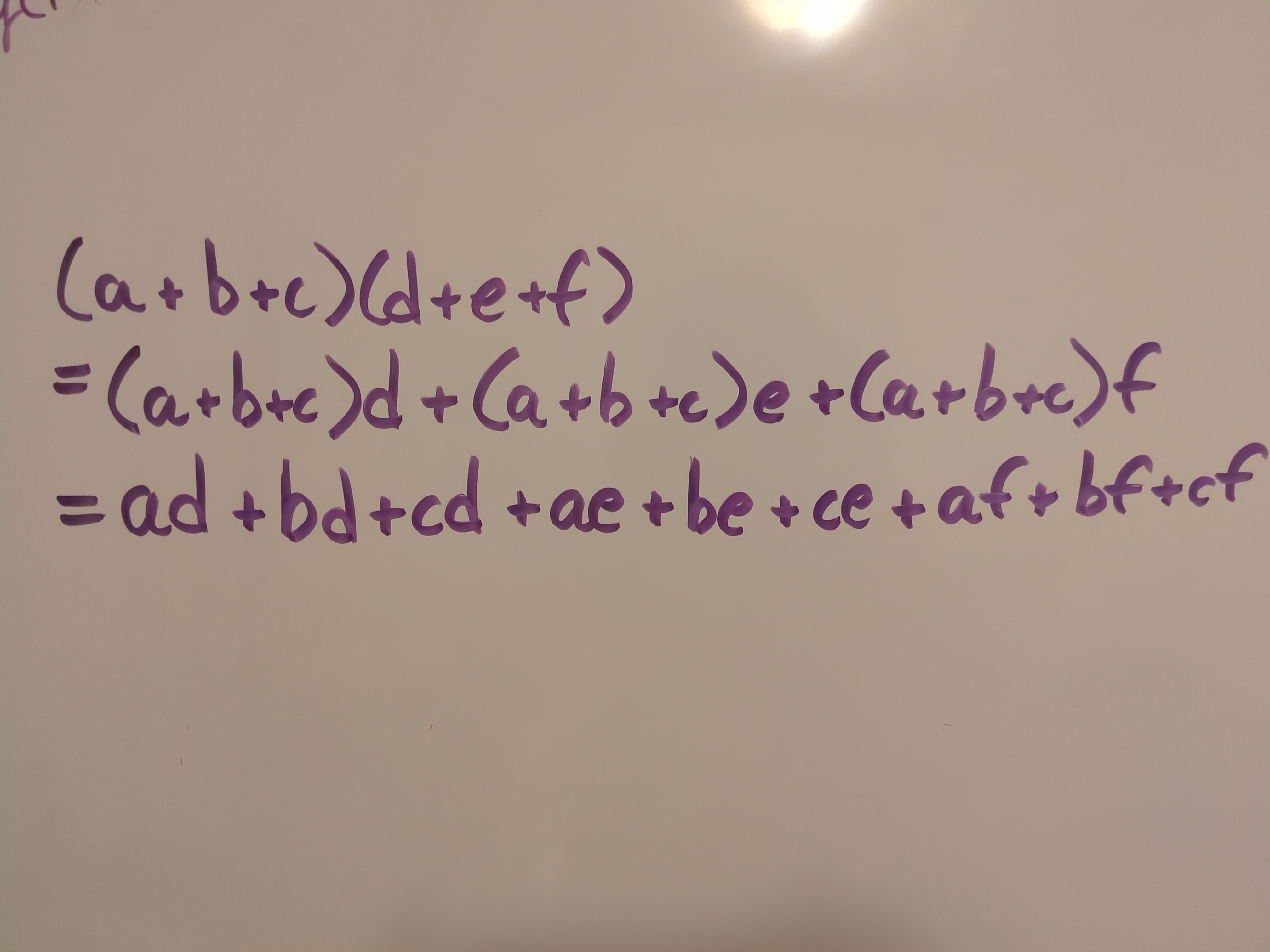 Multiplying two trinomials with distributive property