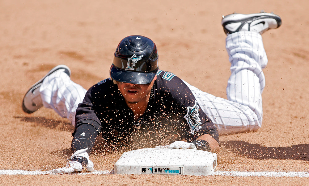 Why head-first slides in baseball are faster. [See body.]