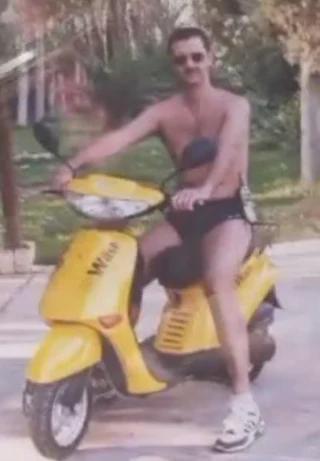 The Lion of Damascus in a yellow moped