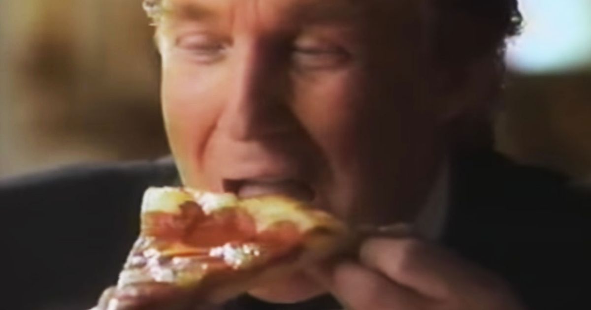 trump eating pizza backwards crust first