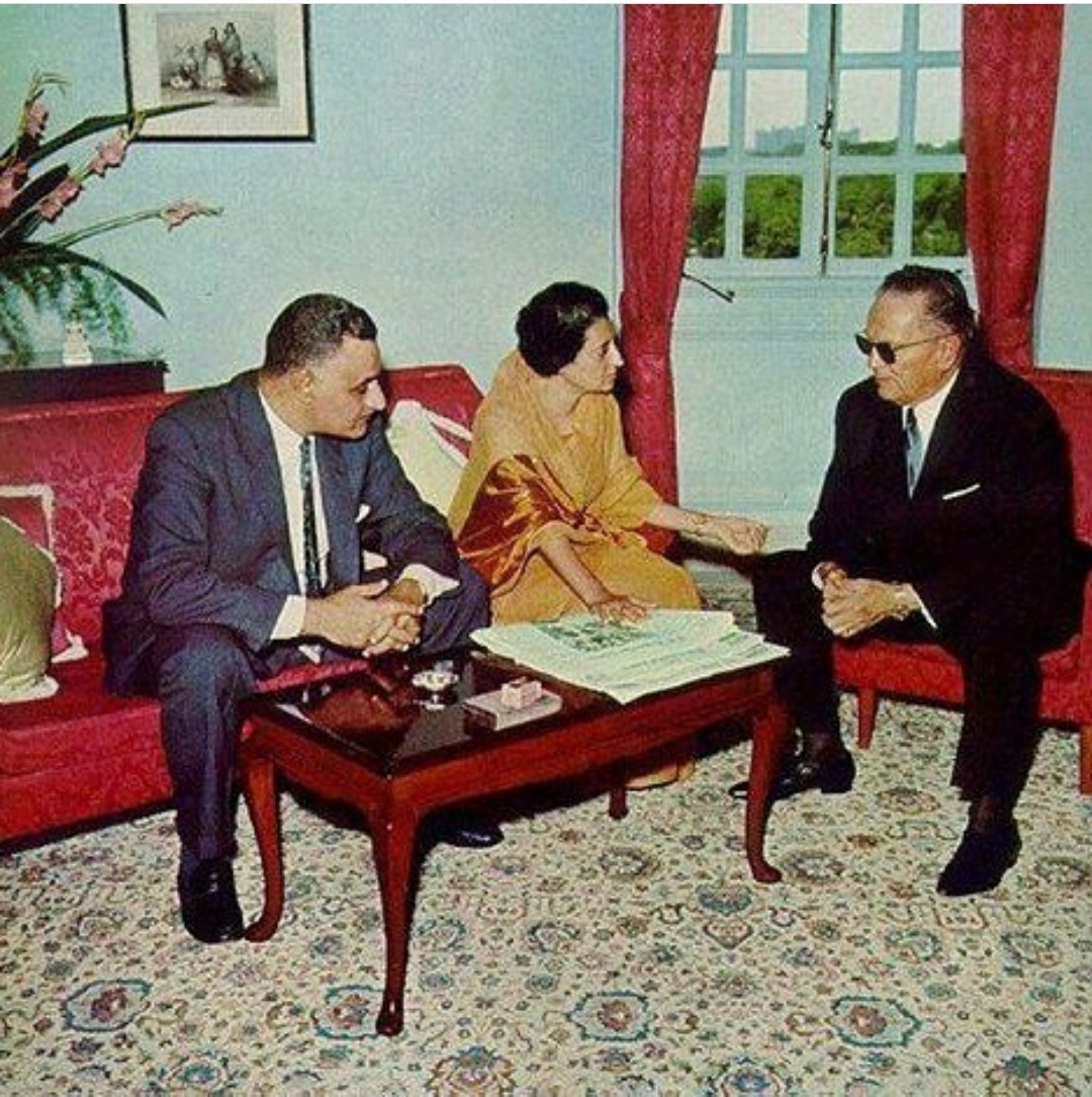 Josip Broz Tito, Gamal Nasser, and Indira Gandhi at a table