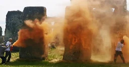 Protesters arrested after painting Stonehenge monument orange