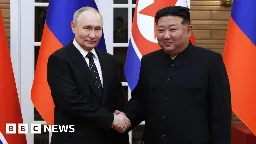 North Korea: Putin and Kim pledge mutual help against 'aggression'