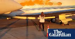 Two people arrested after activists spray private jets with paint at Stansted